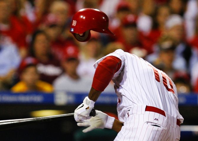 Philadelphia Phillies Francisco reacts after being hit in the head with a pitch in Game 2 of MLB National League Division Series baseball playoffs in Philadelphia